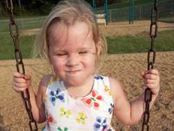 girl on swing photo