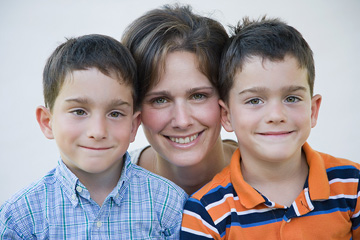 Twin boys and woman photo